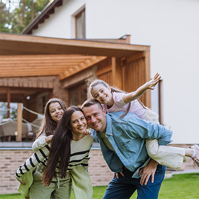 Happy family with home