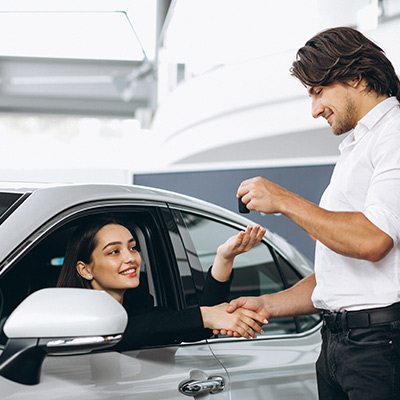 Happy family with car